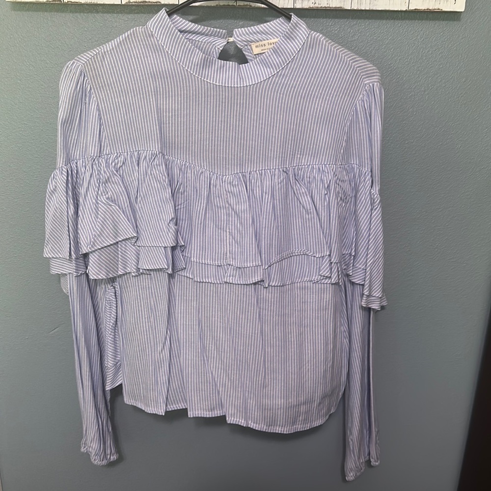 Blue and white stripe long sleeve top with elastic cinching at wrist